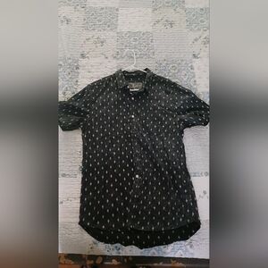 black shirt with white dots